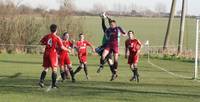 Keeper outjumps all to foil the Hempnall forwards 