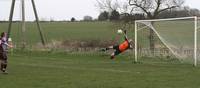 Flying save keeps out the Hempnall number 9